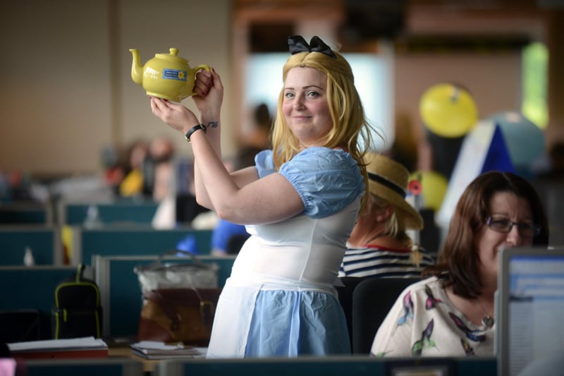 Carrie Gordon was dressed as Alice for the Mad Hatter's Tea Party day at EDF, in 2013.
Staff were raising money for Marie Curie Cancer Care.