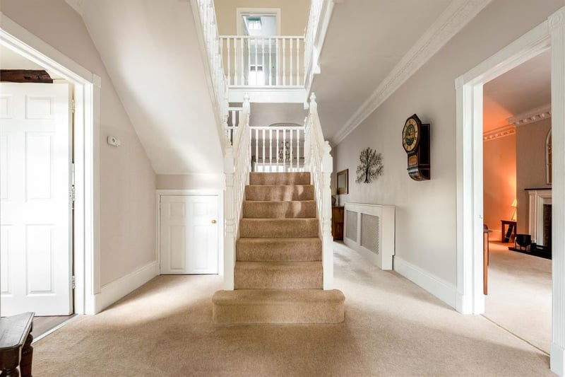 Upon entering the property, doors to the right of the staircase lead to the lounge, while walking right past it leads you to the kitchen and dining area.