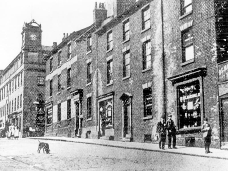 Howard Street, Sheffield, in 1902, showing premises including W. Wilkinson and Co patent medicine vendors, Douglas C. Marshall tea merchant, with Walker and Hall, Electro Works, silversmiths, in the background