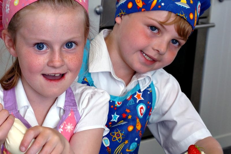 Katie McHugh and Fynn Jameson, both 7, were hard at work in the pupils' kitchen in 2012. That was the year when the school's menu won the competition to feature in the Delicious Food Festival.