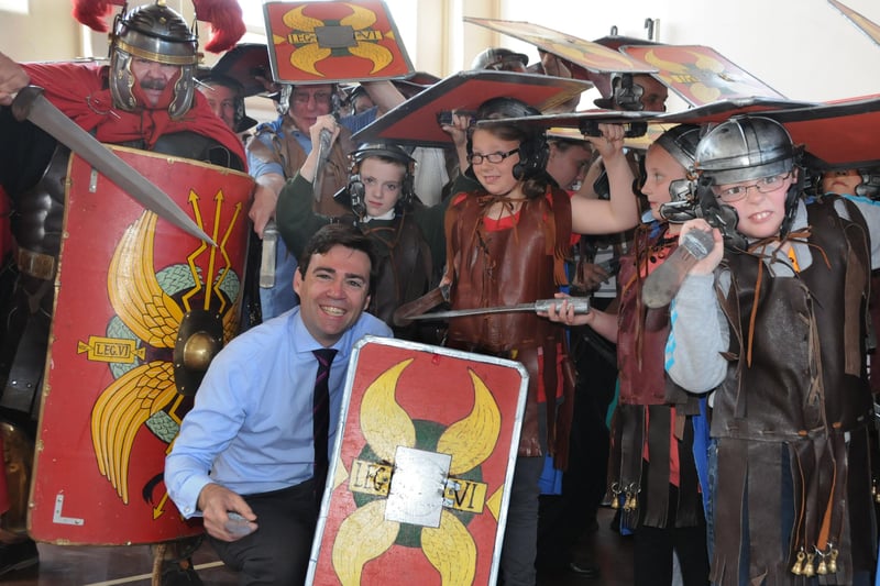 Shadow Cabinet Minister Andy Burnham was surrounded by a group of Roman soldiers when he visited the school in 2011.