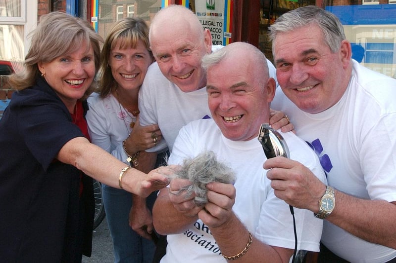 Newsagent Tommy Jackson had his head shaved for charity in August 2003.
