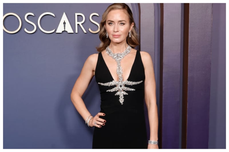 Although Emily Blunt chose a very similar look to Margot Robbie, she still looked elegant in a black Miu Miu gown