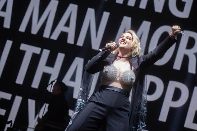 Rebecca Lucy Tayor, aka Self Esteem, on stage at Glastonbury in 2022 wearing the Meadowhall-inspired brassiere. Image by Jamie MacMillan with permission granted to Meadowhall.
