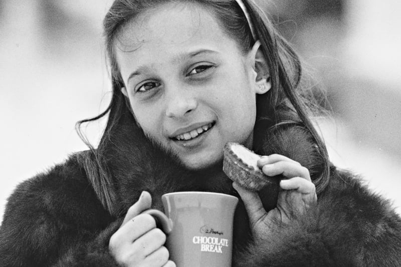 Hungarian-born Anika Salga trying hot chocolate and mince pies. Tthe Conductive Education Centre in Northfield is mentioned.