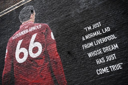 A detailed view of the Trent Alexander-Arnold mural on Sybil Road near Liverpool's Anfield stadium.