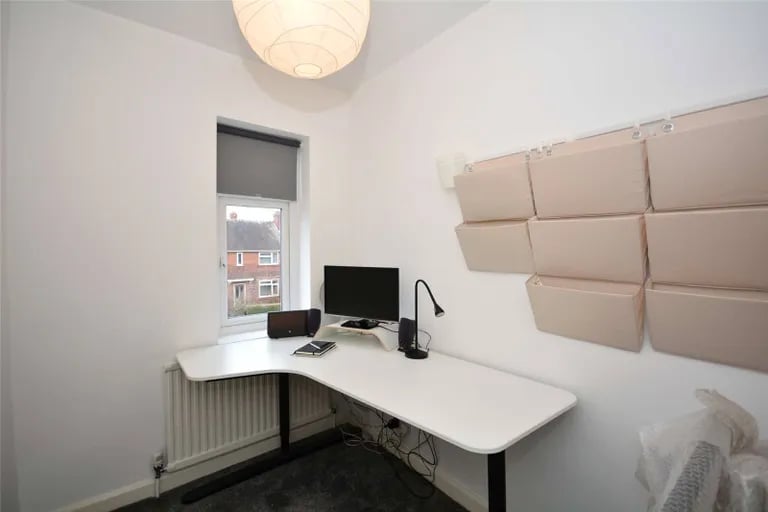 A third, single bedroom can be used as an office.