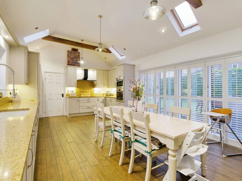 The kitchen/dining room receives plenty of light from the large glass doors to the garden. (Photo courtesy of Zoopla)