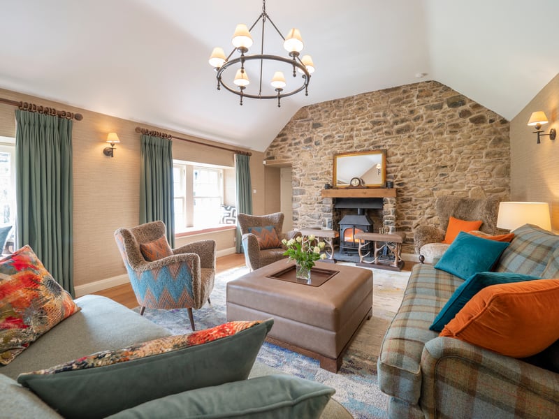 Interior: The main accommodation comprises a large open-plan kitchendining room, lounge, formal dining room, and ground-floor bedroom, with four more on the first floor. A twobedroom annexe with sitting room and dining area in the glazed atrium is ideal for hosting guests or lets.