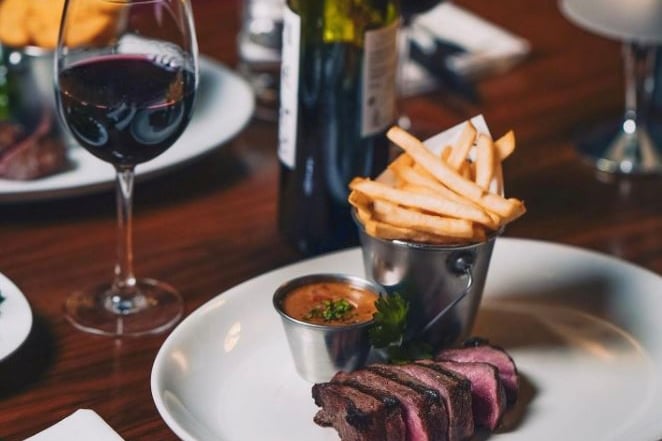 Take advantage of The McMillan's steak and wine for two deal every Monday to Wednesday where you can get two 8oz 28-day aged flat-iron steaks, two sides, two sauces and a bottle of wine for just £45 for two people!