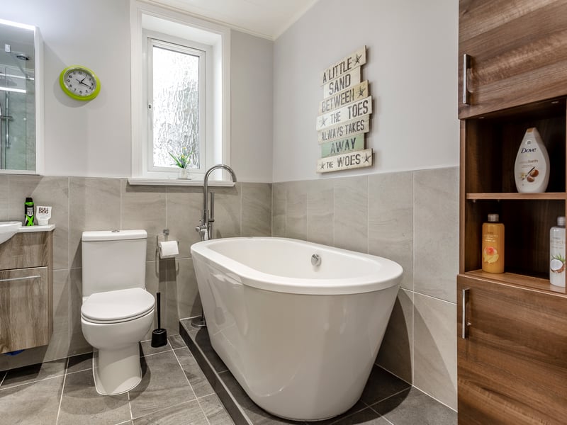 Interior: The bright and airy hallway opens to a multi-aspect lounge with roof lanterns and floor-to-ceiling windows. There is an open-plan kitchen, dining and family room, cloakroom, utility room, principal bedroom with ensuite.