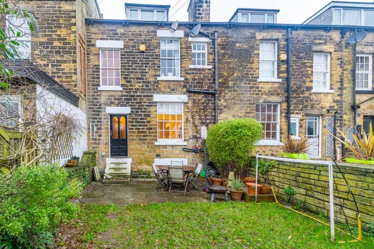 Externally is a delightful garden to the rear.