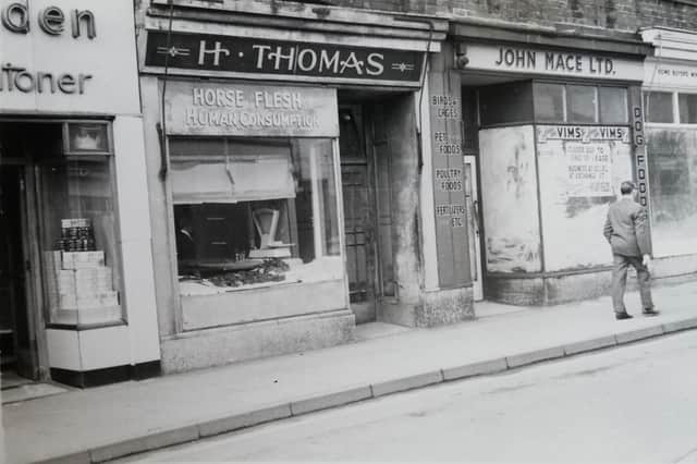 A butchers shop at Moorfoot, Sheffield city centre, advertising horse meat for human consumption in around 1969