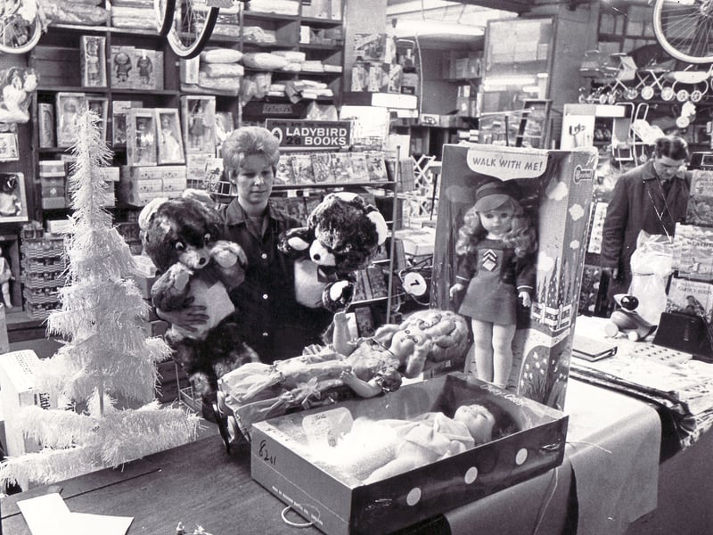 Shop assistant Irene Jagger in the doll department at Northern Trading Co, on Paradise Street, Sheffield, in October 1969
