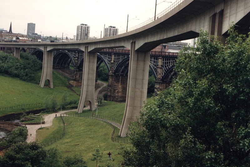 A view of the Byker Metro Bridge taken in 1986. The Byker Metro Bridge is in the foreground with the Ouseburn Viaduct (1839) behind.