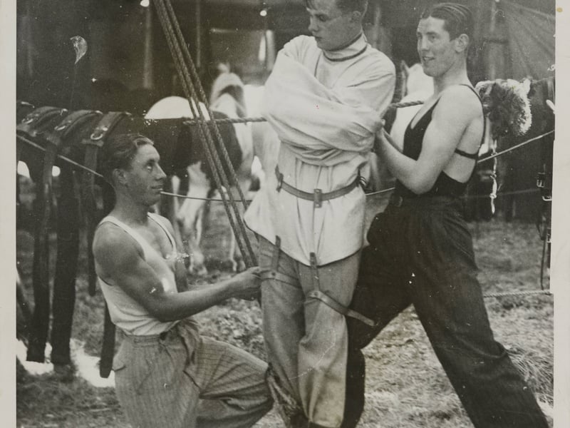 Edward C. Beck, a Cambridge undergraduate, was a member of the Magic Circle. In this picture from the 1920s shows the 23-year-old being fixed in his straight jacket ready for his act with a circus at Squire's Gate