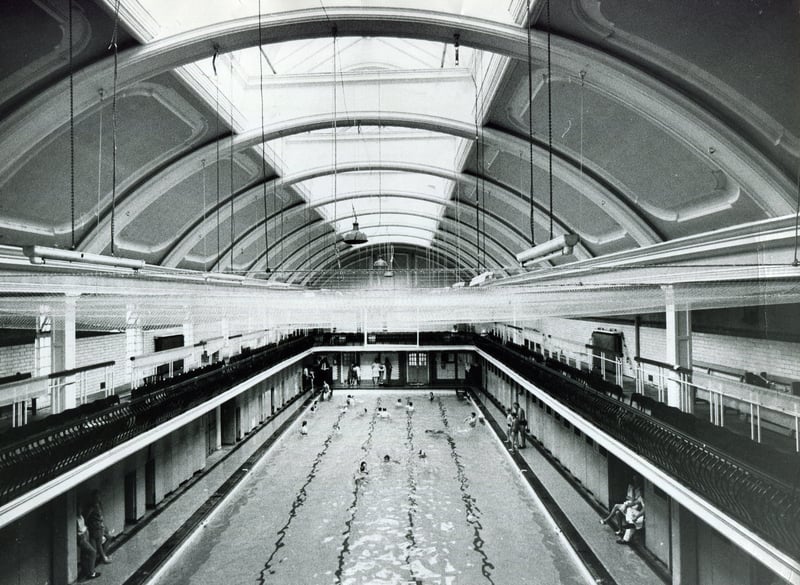 Sheffield's Glossop Road Swimming Baths pictured in July 1969, with a net slung underneath the crumbling roof to catch falling pieces
