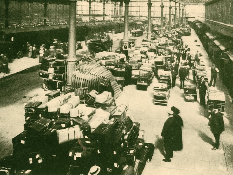Passengers' Luggage at Talbot Road Station, in the Holiday Season of 1930. From "The Wonder Book of Railways", edited by Harry Golding. [Ward, Lock & Co., Limited, London and Melbourne, 1930]. Artist Unknown. (Photo by The Print Collector/Getty Images)
