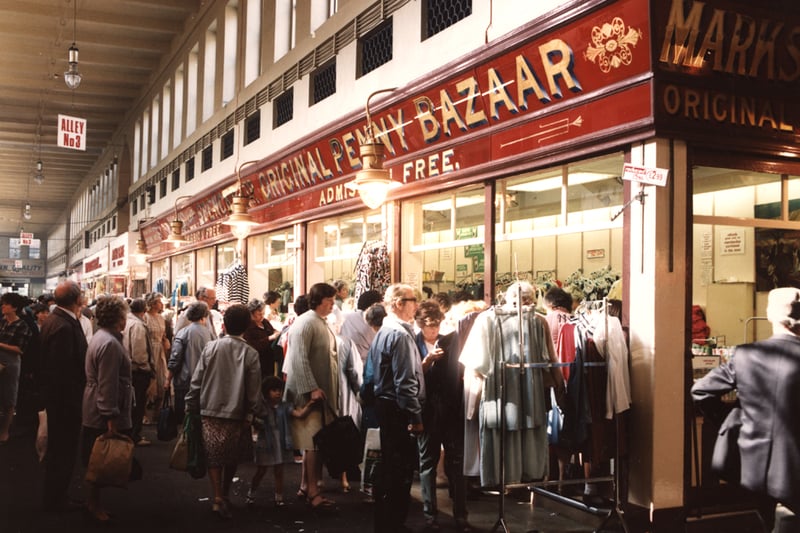  A view of Grainger Market Newcastle upon Tyne taken in 1985. The photograph shows Marks and Spencer's Original Penny Bazaar. The stall is crowded with people.