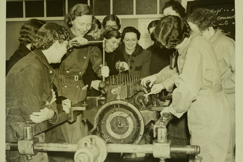 Women Ambulance Drivers In Training. More than a hundred women enrolled as ambulance drivers under the Womens' Voluntary Service.At the Blackpool Corporation Driving School they are taught A.R.P, mechanics and gas drill. The picture shows women ambulance drivers receiving instruction on a car engine at Blackpool, Blackpool. (Photo by Hulton Archive/Getty Images)