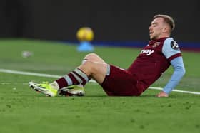 West Ham United's Jarrod Bowen reacts following an injury during the English FA Cup third round football match between West Ham United and Bristol City at the London Stadium, in London on January 7, 2024. (Photo by ADRIAN DENNIS/AFP via Getty Images)