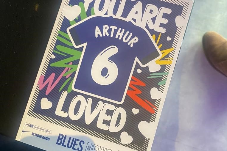 The programme also featured Arthur's name on the front cover with the words 'You are loved'.