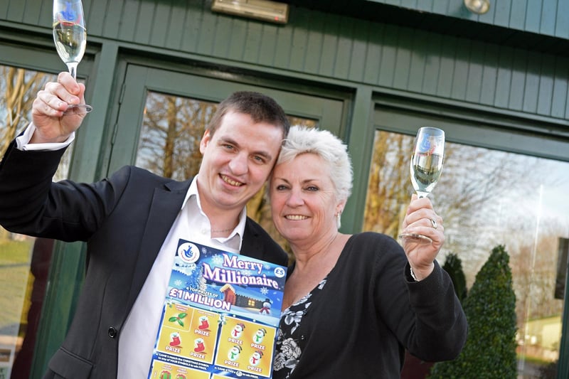 Scratchcard Merry Millionaire winner Richard Carr, from Doncaster, celebrates with his mother Sarah Simmons. Richard, who was working as a general assistant at a hotel, told how he had bought the scratchcard while waiting for the next bus after dropping his son home, having missed the bus he was aiming for
