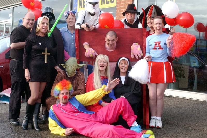 Staff from Reg Vardy Fiat and Alfa Romeo were fundraising in fine fancy dress style for Children In  Need in 2003.