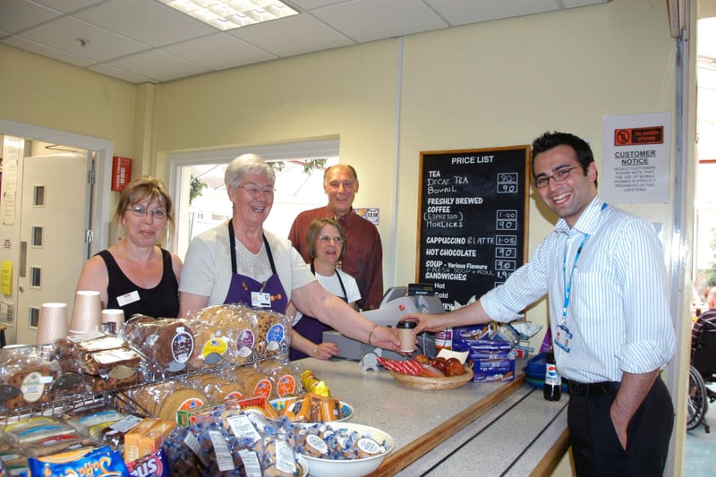 Project manager Philip Wilkinson, right, and his staff serving a customer in the WRVS cafe at Sunderland Royal Hospital in 2008.