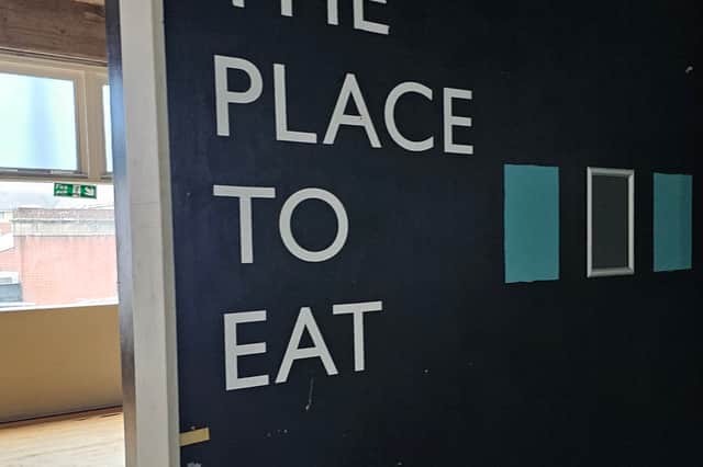 A sign for the cafe at the old John Lewis store in Sheffield city centre