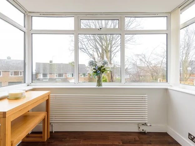 To the rear of the kitchen, this breakfast area offers a space to enjoy your morning meal with a view. (Photo courtesy of Whitehornes Estate Agents)