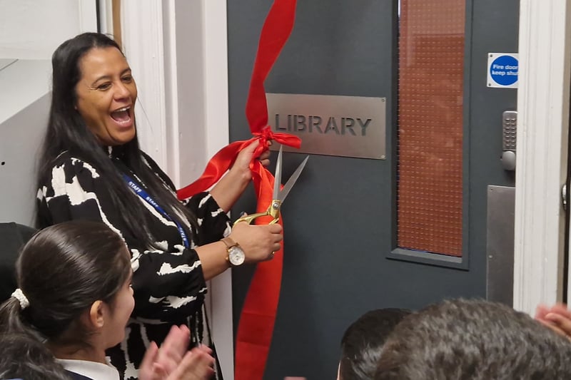After months of work, Principal Marie Elliott snips the ribbon on High Hazel Academy's new library in Sheffield. Children gasped as they were first let into their new treasure trove of books.
