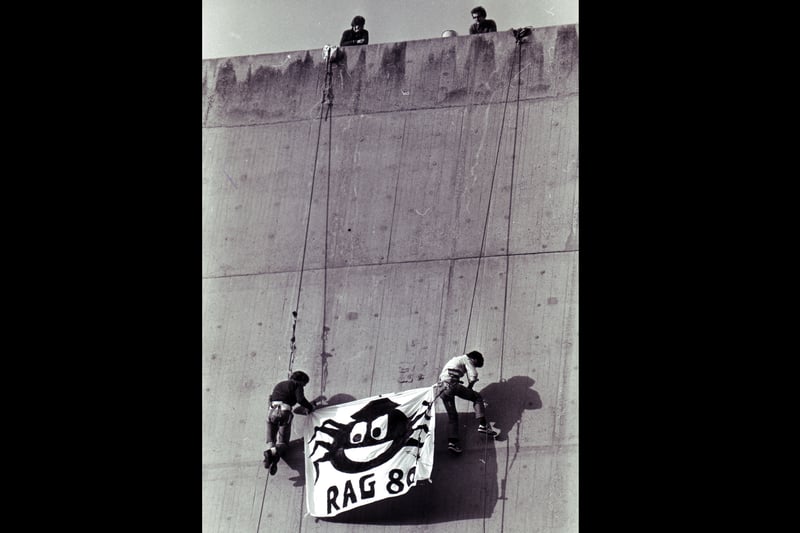 Two students from Sheffield Polytechnic, Julian Smallman and Senan Hennessy, abseiled down the side of the Polytechnic building, Pond Street, for the Rag Parade 1980.
