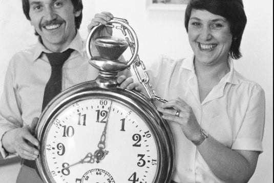 Harry Collinson and Sandra Collinson with the outsize pocket watch which they planned to hang outside their premises in Blandford Street, in 1981.