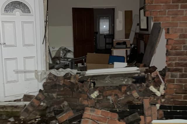 Pictures show the damage after the cars were removed after crashing through the front of a house. Submitted picture