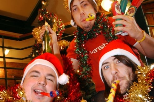 Varsity workers Dave Carney, Darren Hill and Dave Rackstraw were getting into the Christmas party mood 20 years ago.