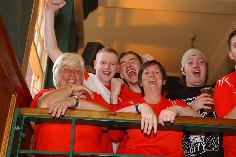 England fans who were full of smiles while watching the 2004 game with France on TV at Varsity.
