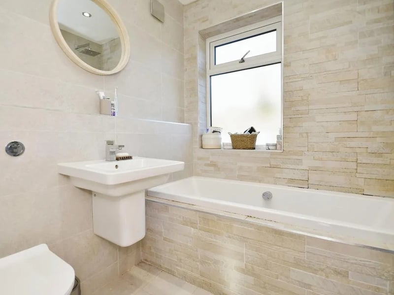 The bathroom gives you everything you'd need with a toilet, sink and shower/bath. (Photo courtesy of Zoopla)