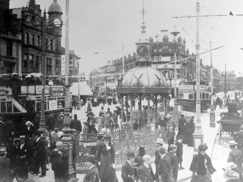 The trams seen here in Talbot Square are on the Marton route, which followed Clifton Street, Church Street and Whitegate Drive. The foundation stone for the drinking fountain, with it's elaborate cast iron canopy, was laid in 1870 by William Henry Cocker. The fountain was demolished in the 1920s and was later replaced by a large tram shelter.