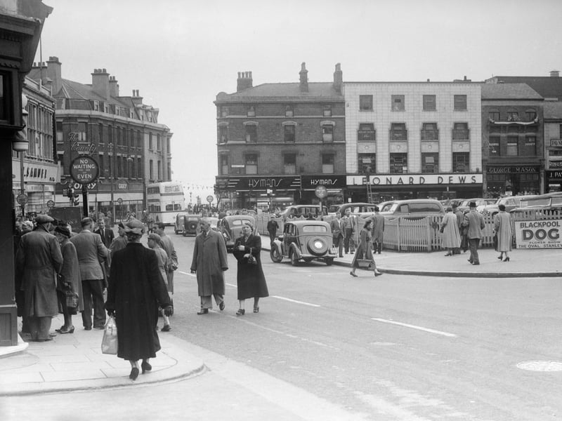 View from Grand Theatre , Church Street in 1952 looking towards the jewellers shops on Market Street. The County Hotel can be seen in the distance on the left and on the right is the site which once included the old St Johns Market which was replaced by the new one in King Street in 1938. Btitish Home Stores and a multi storey car park was later built on this site.