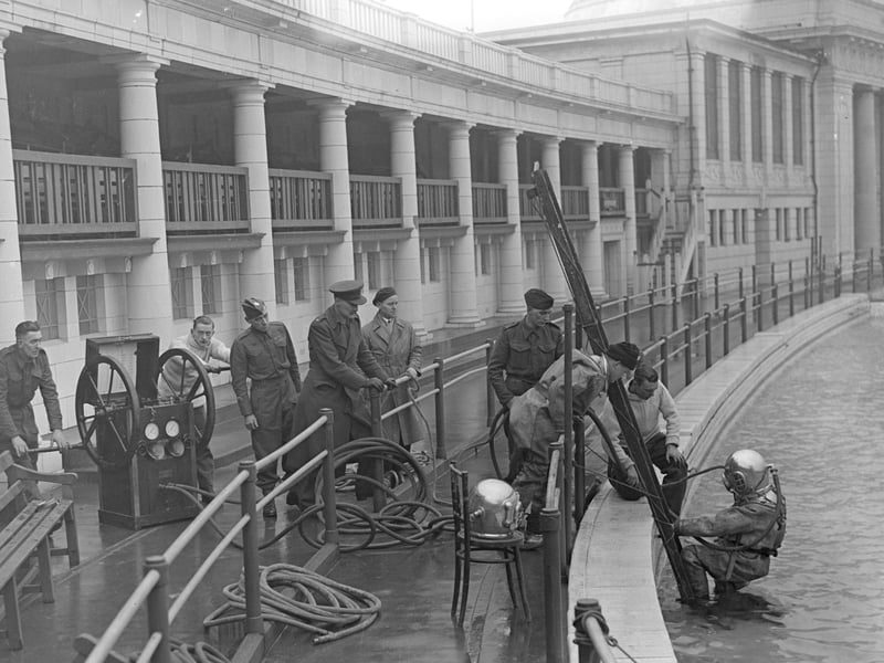 Deep sea divers in Blackpool Open Air Baths