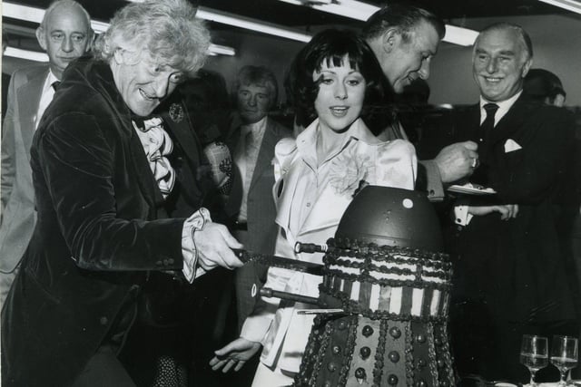 Dr Who actors Jon Pertwee and Elisabeth Sladen with a chocolate Dalek baked specially for the opening of the Dr Who Exhibition in Blackpool in 1974