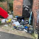 Fly-tipping at an empty house in Firth Park, Sheffield. The council says it has written to the landlord of the property, at the corner of Wheldrake Road and Hucklow Road, urging them to remove the rubbish as soon as possible. If the owner fails to act, the council says, it will get the waste removed and send them the bill.