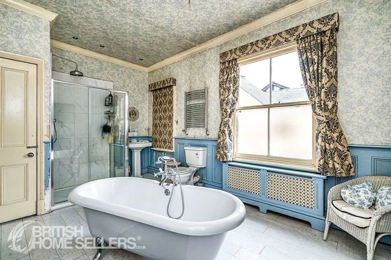 A well-appointed and stylish bathroom featuring modern fixtures and fittings.