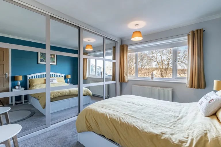 The main bedroom offers impressive views to the front of the property and the canal and has built-in wardrobes.
