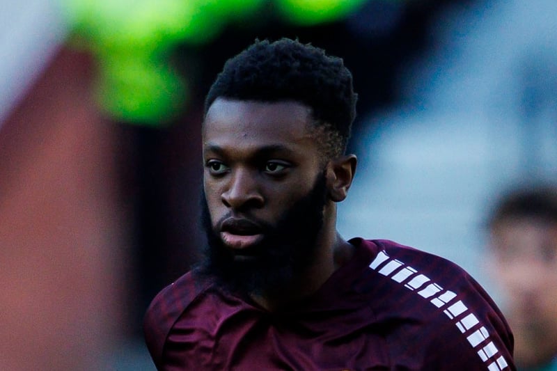 Doubt - the Congolese midfielder was forced off during the Jambos 3-2 win over Dundee. 