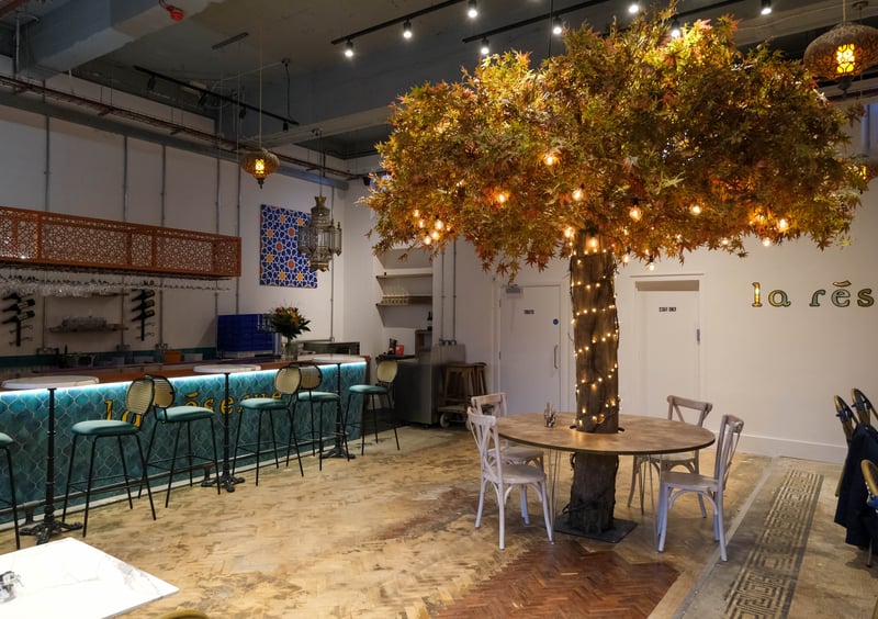 This chic new cafe/restaurant in Broomhill is located in a former bank. The interior is furnished with a beautifully illuminated 3.3 metre tall tree, marble tables and elegant lamps. Some original features from its days as a bank have been retained, like the mosaic tiled floor.