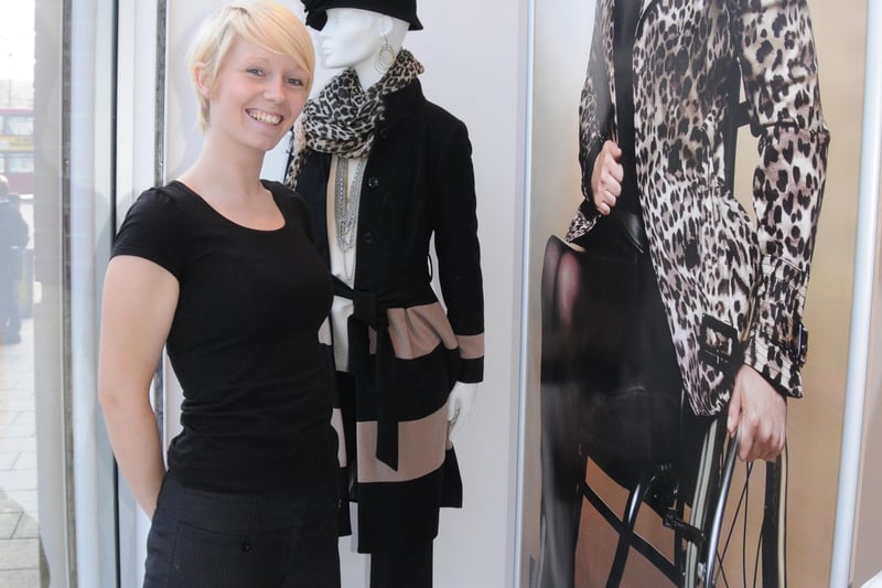 Visual manager Suzanne Smillie was pictured with the window display poster of a model in a wheelchair in 2010.
