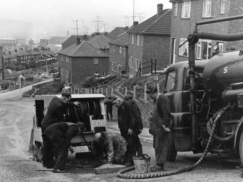 Sheffield Corporation City Engineers Department  cleaning out grates on Jenkin Road, Wincobank, in the 1960s