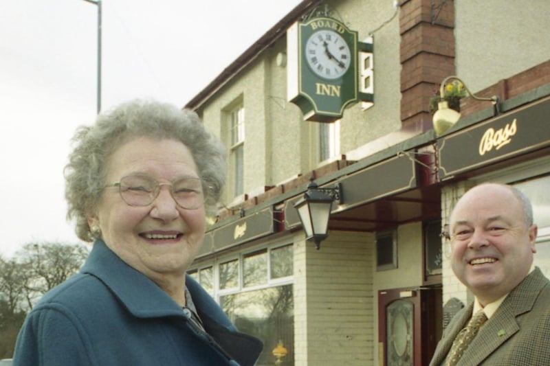 A 2000 photo with Bette Richardson and Coun Les Scott in front of the Millennium Clock at the pub.